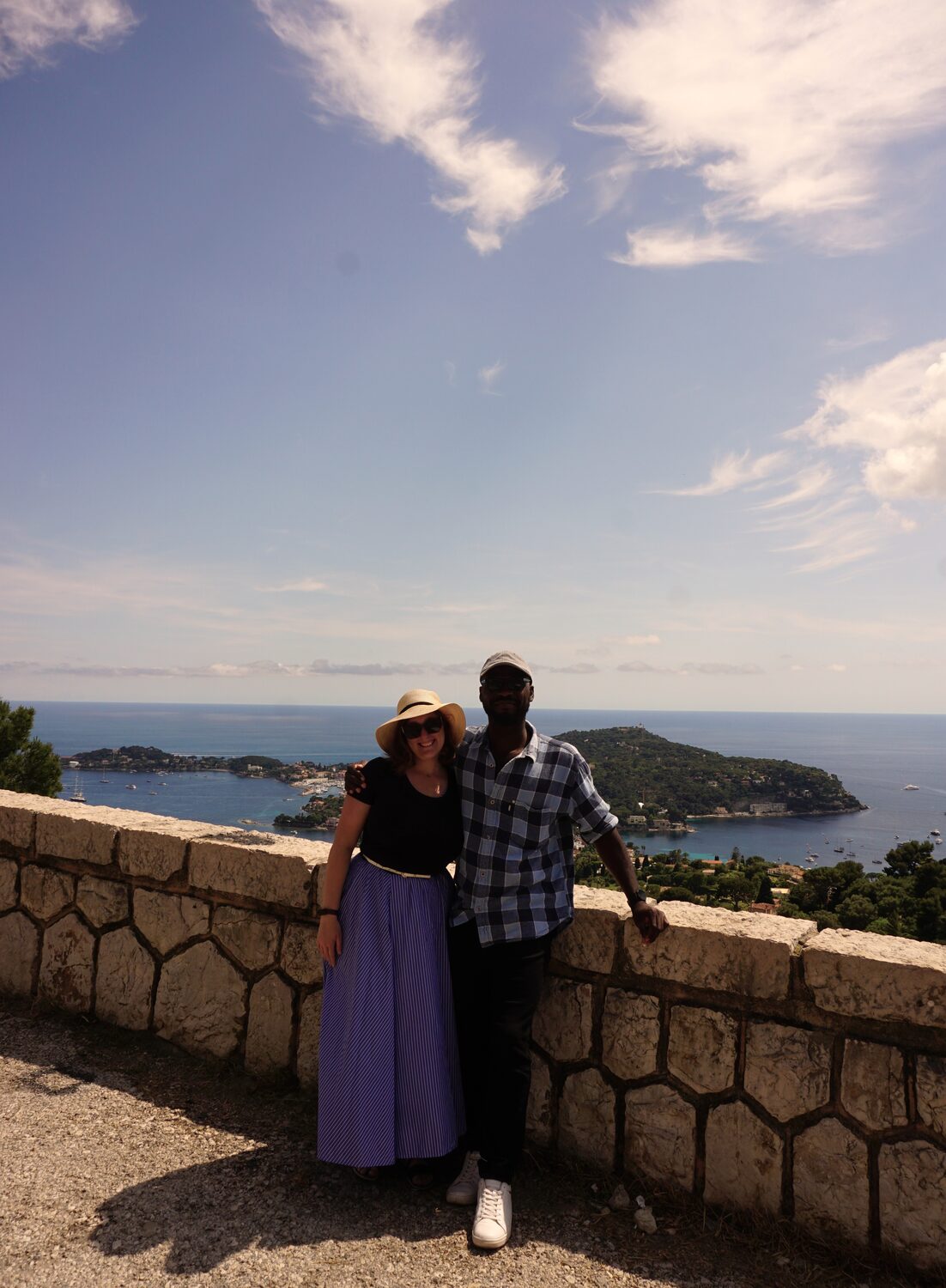 A couple taking in the view at a Riviera viewpoint