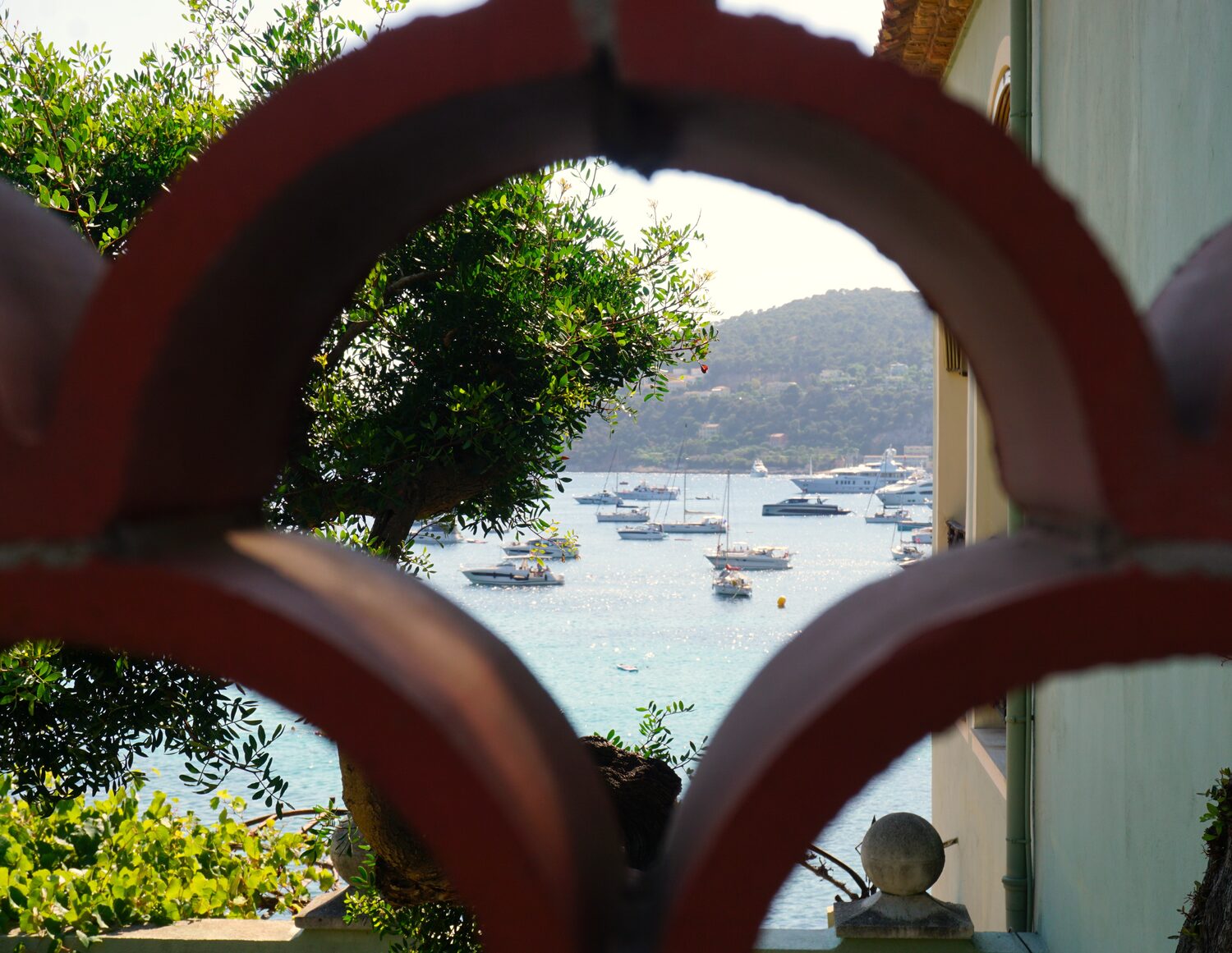 A Riviera harbour framed through a life ring