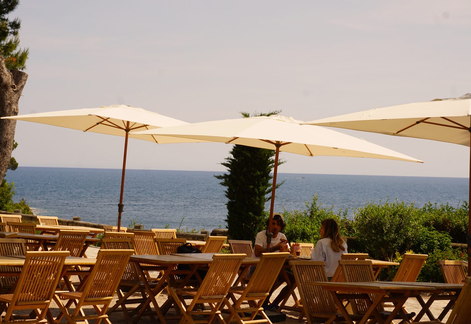 A table set beside the Mediterranean sea